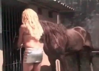 She loves jerking this horse's dick